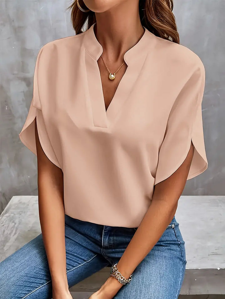 Women's lightweight blouse with elegant design, versatile for any occasion, shown in a range of colors, perfect for layering.