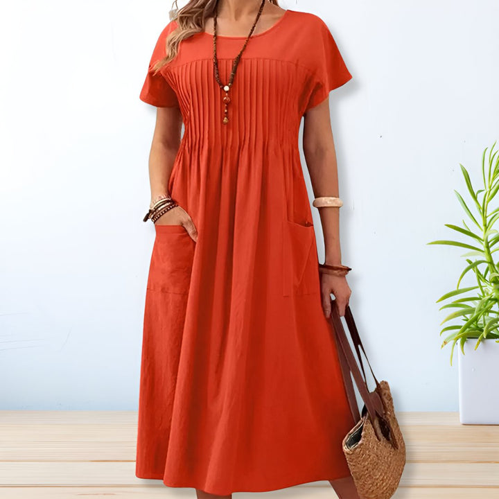 "Women's linen cotton summer dress, relaxed fit with pockets, short sleeves, mid-length, beige color, breathable fabric."