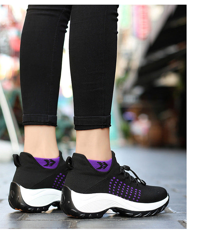 "Women's orthopaedic comfort shoes with contoured footbed, mesh upper in black and purple, providing advanced support."