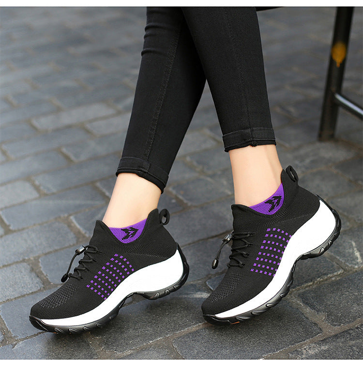 "Women's orthopaedic comfort shoes with contoured footbed, mesh upper in black and purple, providing advanced support."