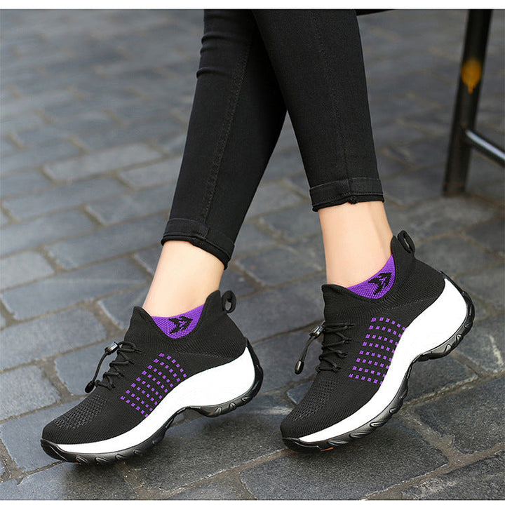 "Women's orthopaedic comfort shoes with contoured footbed, mesh upper in black and purple, providing advanced support."
