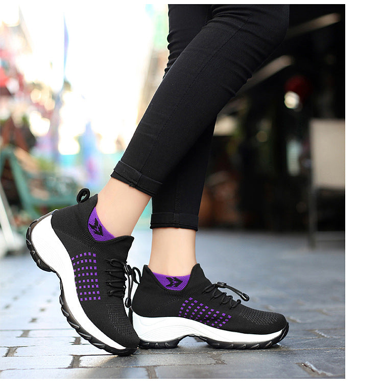 "Women's orthopaedic comfort shoes with contoured footbed, mesh upper in black and purple, providing advanced support."