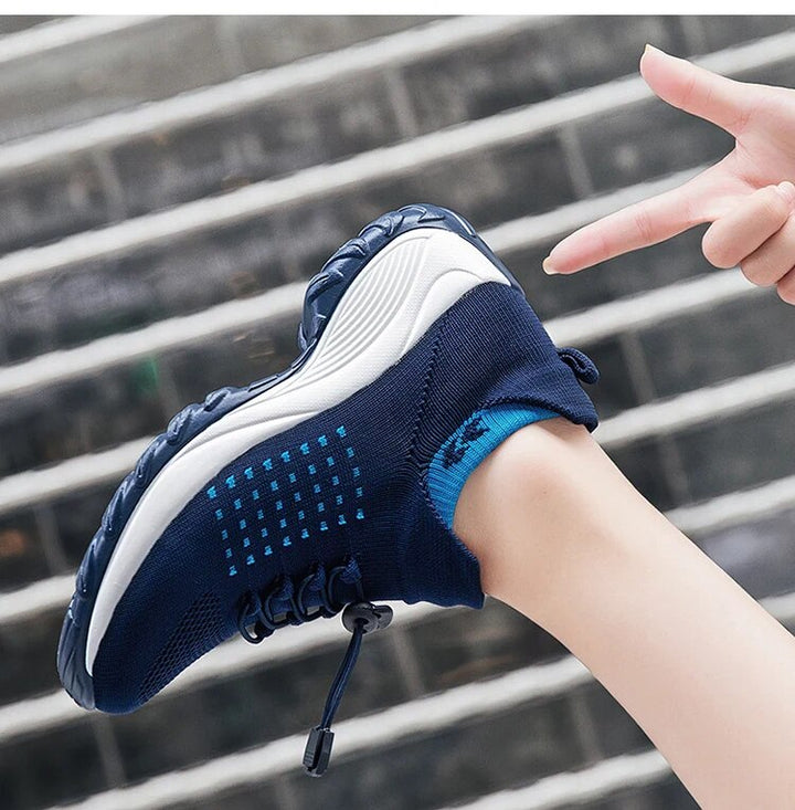 "Women's orthopaedic comfort shoes with contoured footbed, mesh upper in black and purple, providing advanced support."