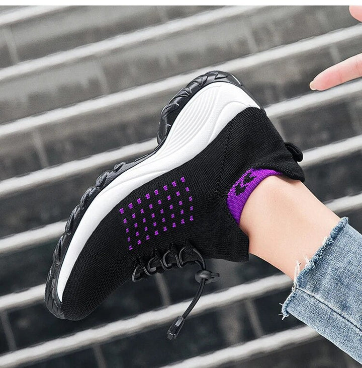 "Women's orthopaedic comfort shoes with contoured footbed, mesh upper in black and purple, providing advanced support."