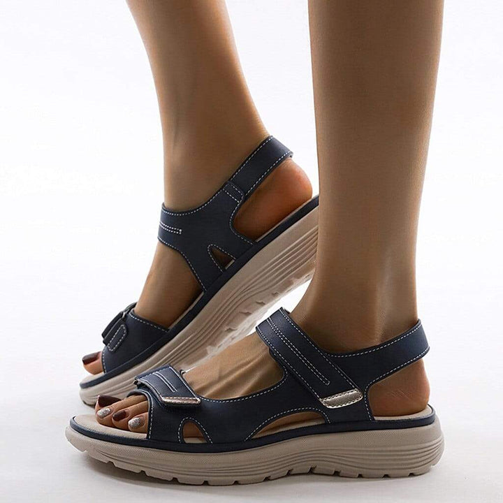 Women's orthopedic sandals with comfort cushioning, stylish design, soft sole, ideal for casual or formal wear.