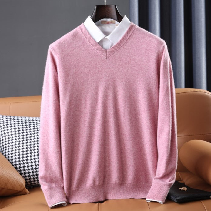 Women's premium cashmere V-neck sweater in soft pink, offering luxury and comfort with an elegant design.