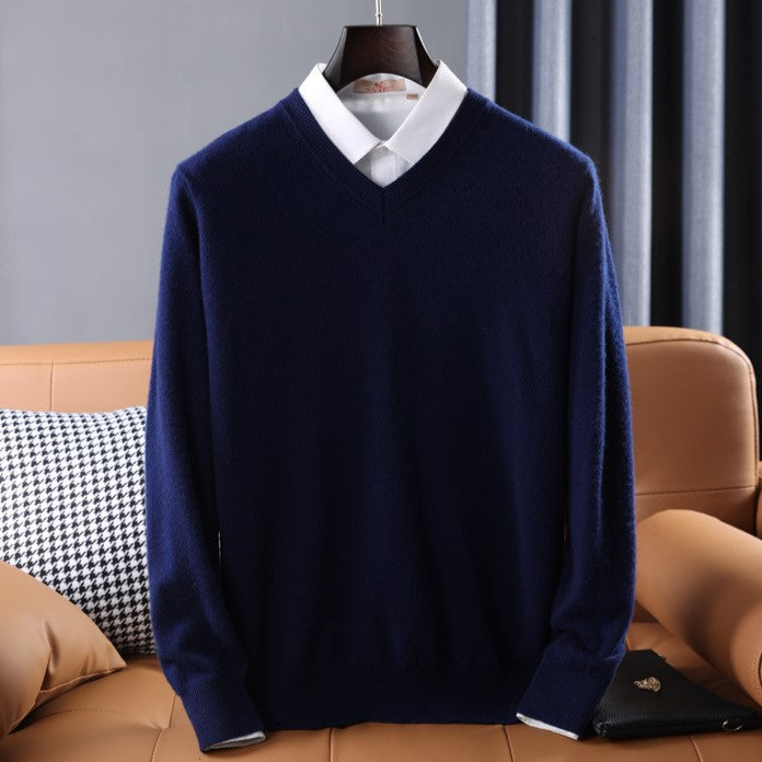 Women's premium cashmere V-neck sweater in soft pink, offering luxury and comfort with an elegant design.