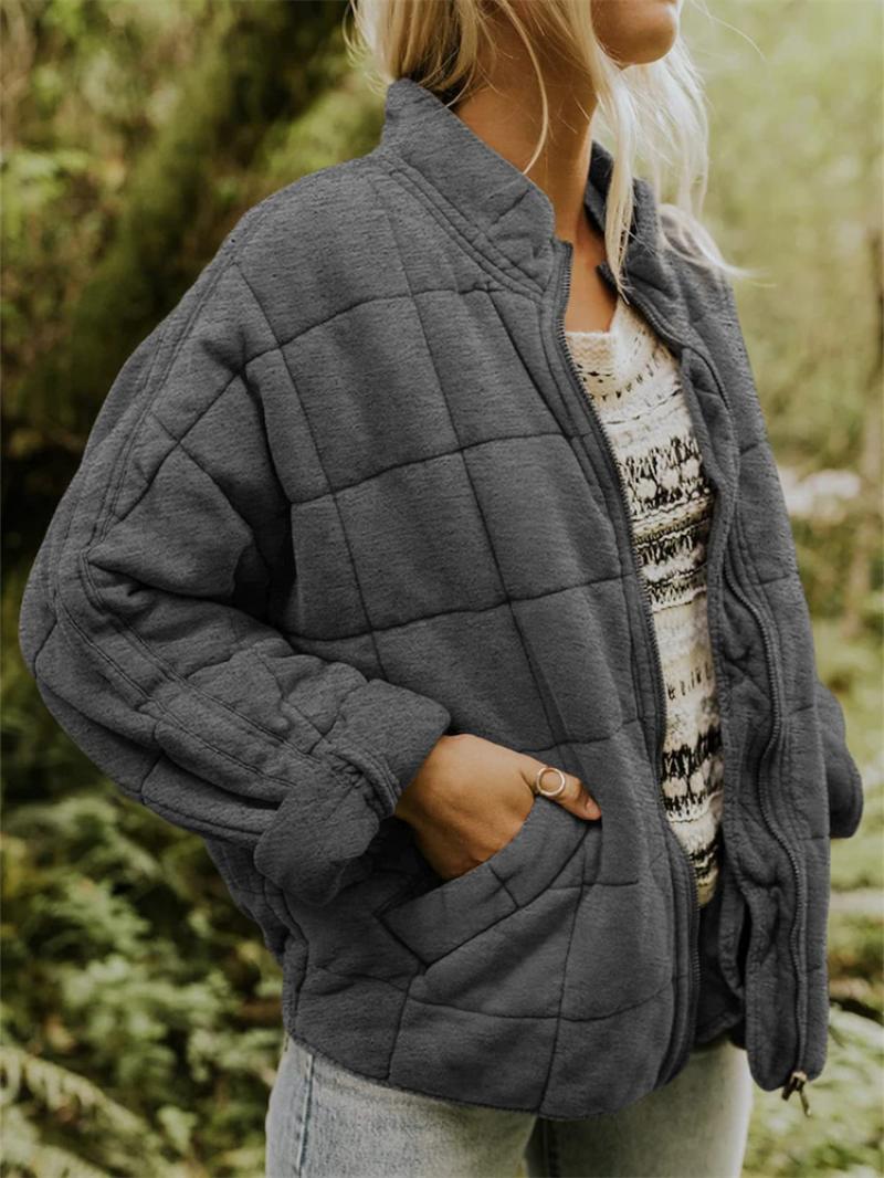 "Women's quilted jacket front view; classic design, versatile; visual texture with balanced warmth, perfect for layering."