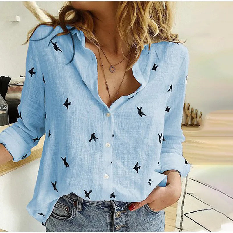 "Women's relaxed bird-print button-up blouse with colorful bird patterns, flowy silhouette, perfect for casual or office wear