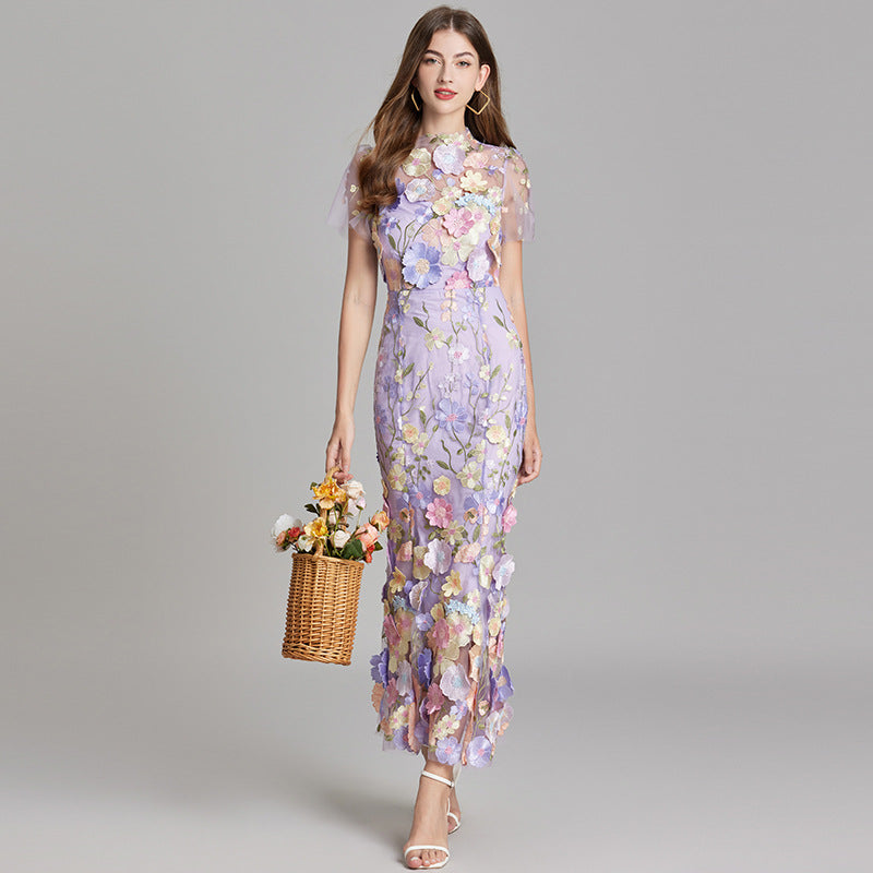 "Women's sheer embroidered maxi dress, elegant and flowing, in various colors; lightweight fabric for special occasions."