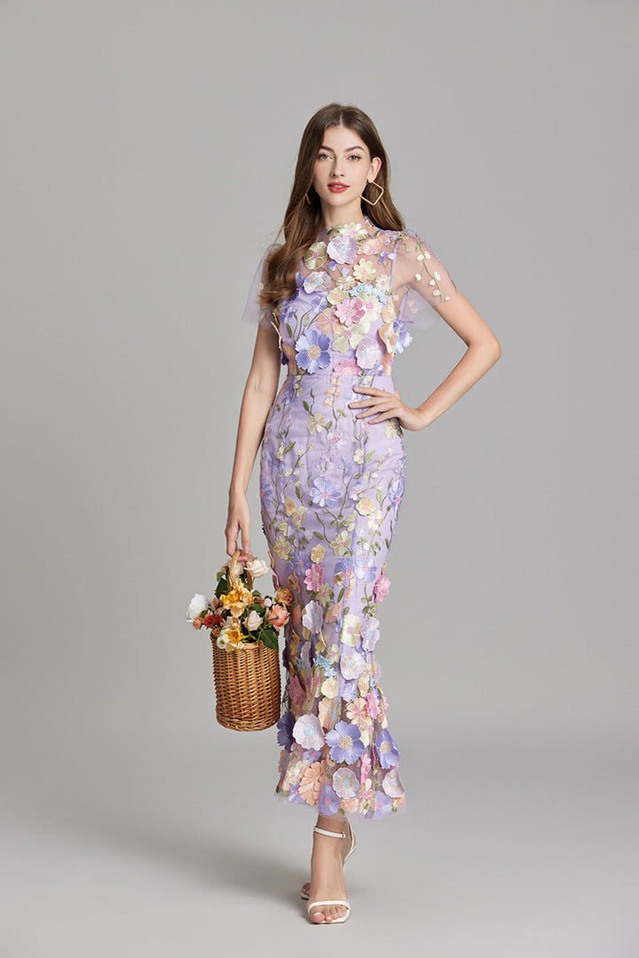 "Women's sheer embroidered maxi dress, elegant and flowing, in various colors; lightweight fabric for special occasions."