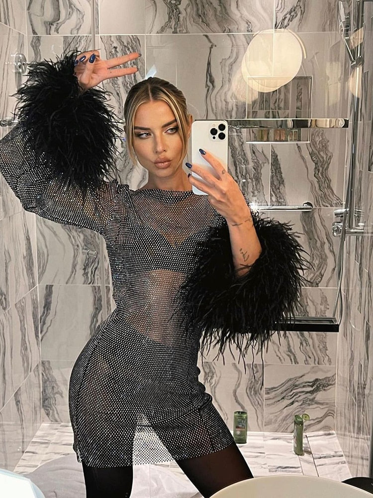 "Women's shimmering evening dress with V-neck, glossy fabric, fitted waist, flared skirt in black, pink, or white"