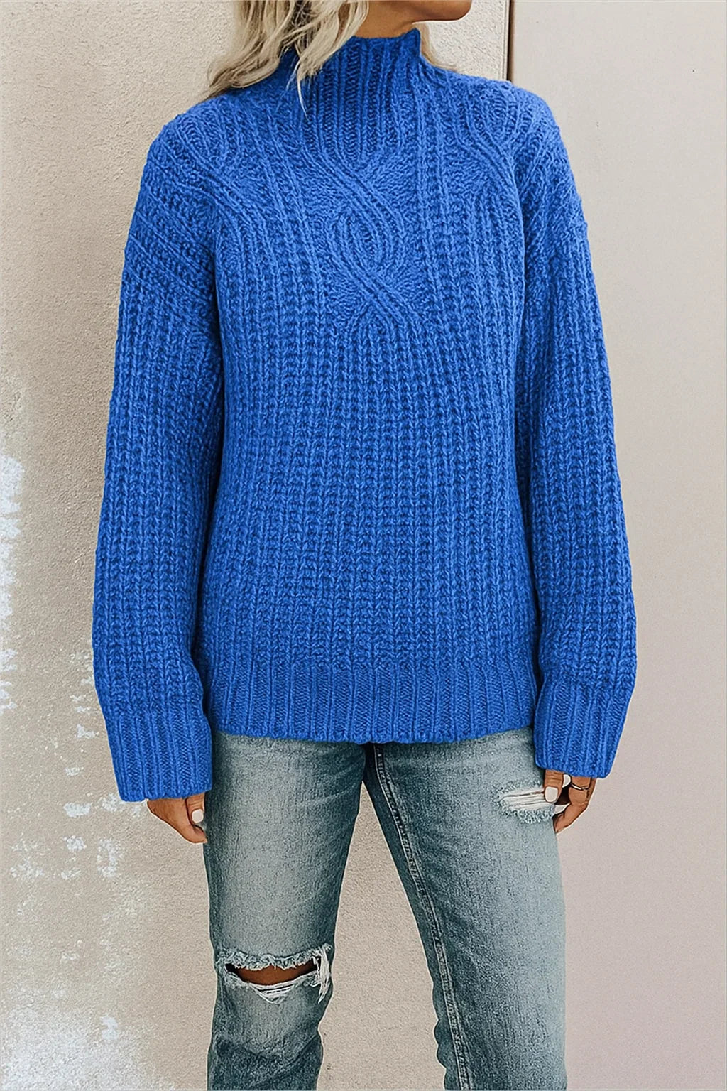 "Women's soft touch casual sweater, classic cut, round neckline, ribbed hems, available in multiple colors."