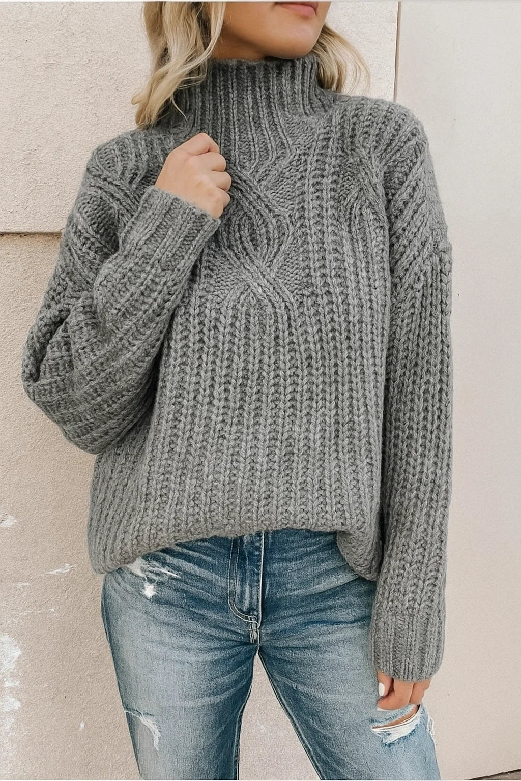 "Women's soft touch casual sweater, classic cut, round neckline, ribbed hems, available in multiple colors."