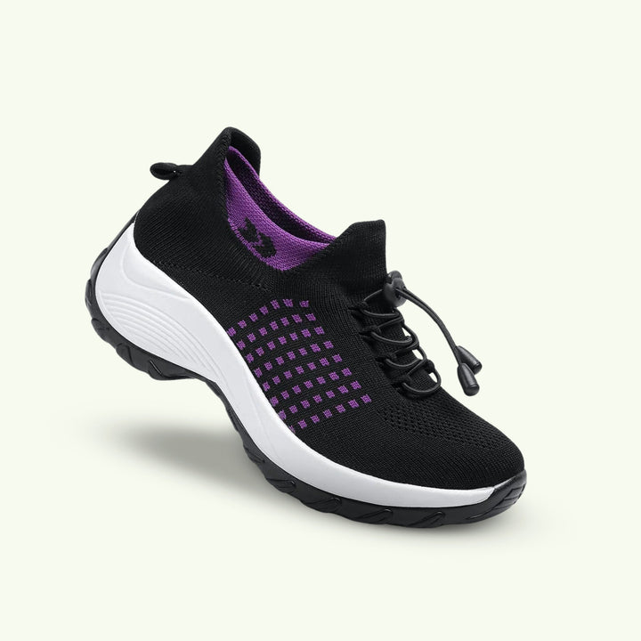 "Women's stretch comfort shoes in black, featuring cushioned insoles and flexible soles for stylish everyday walking relief."