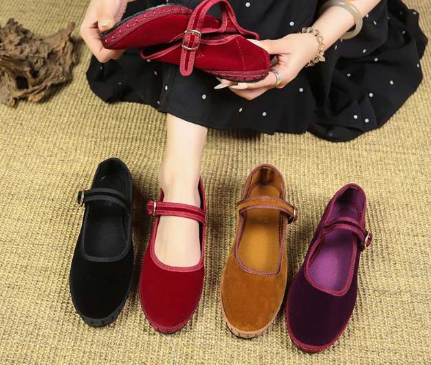 Women's velvet Mary Jane shoes with eco-friendly design, organic cotton exterior, adjustable buckle, and elegant style.