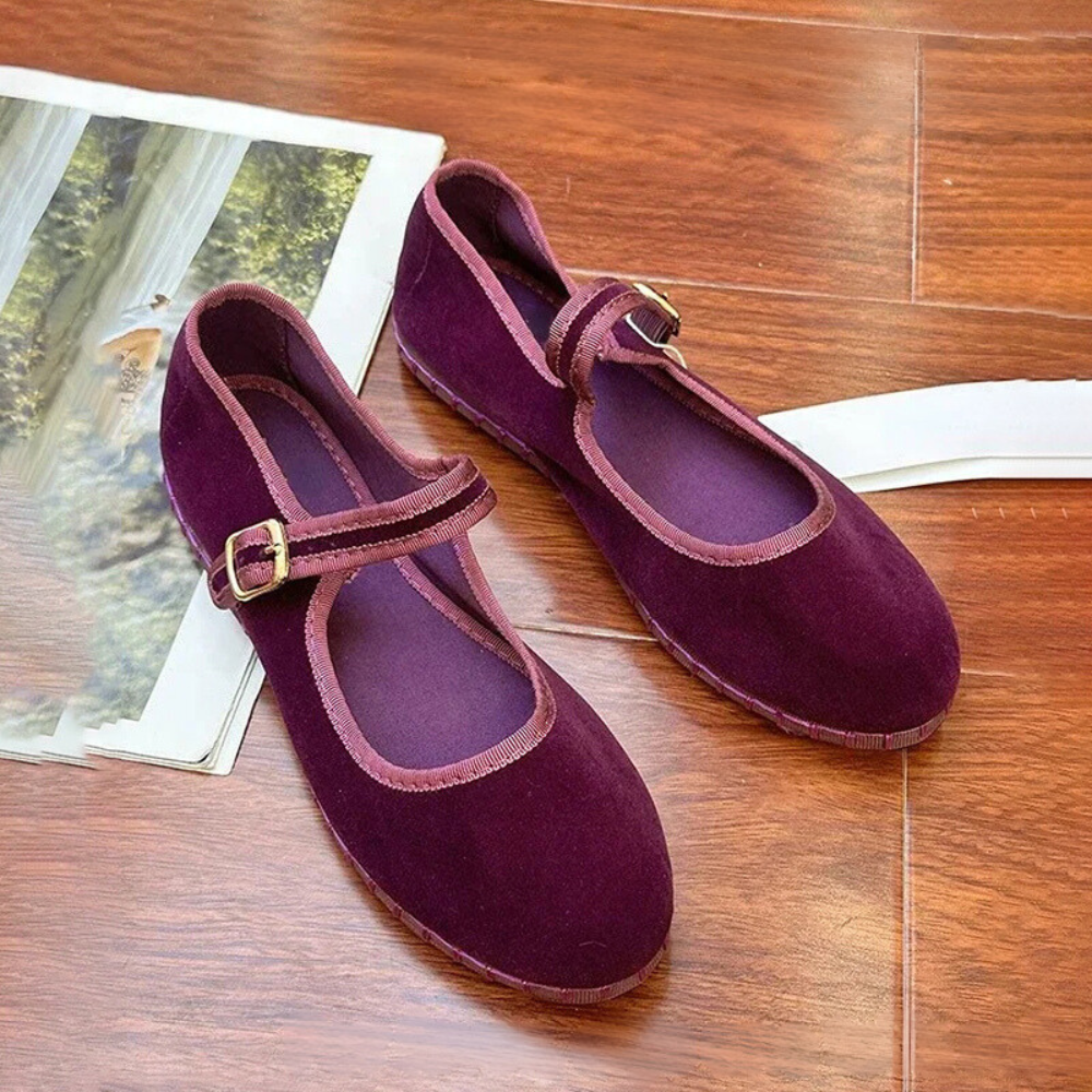 Women's velvet Mary Jane shoes with eco-friendly design, organic cotton exterior, adjustable buckle, and elegant style.