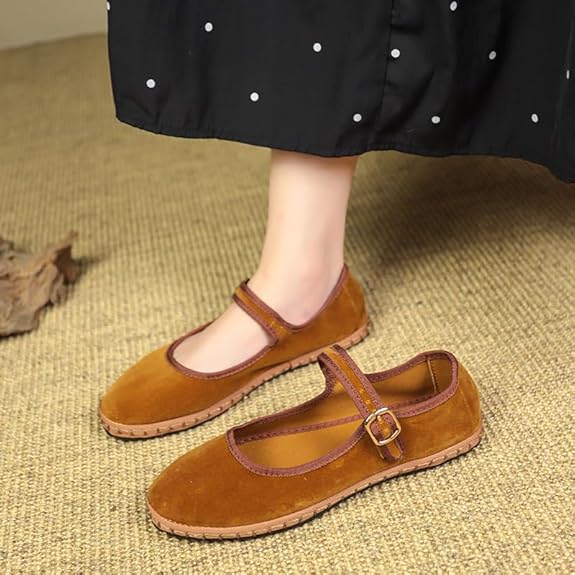 Women's velvet Mary Jane shoes with eco-friendly design, organic cotton exterior, adjustable buckle, and elegant style.