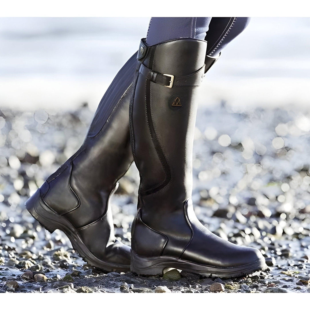 Women's waterproof leather boots with slip-resistant sole, durable build, elegant design, for all-weather comfort and style.