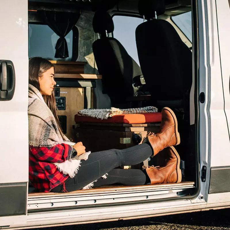 "Women's winter boots, waterproof leather with wool lining, offering style and warmth for cold weather conditions."