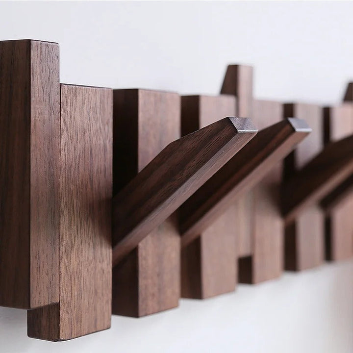 "Wooden Piano Coat Rack with 4 walnut and beech wood hooks, elegant design, ideal for home decoration and organization."