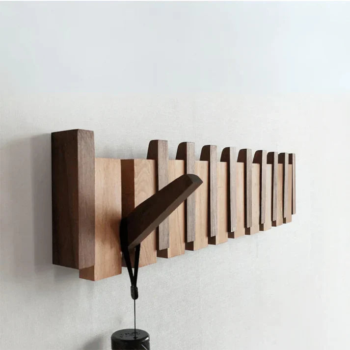 "Wooden piano coat rack with elegant piano-key design, made from beech and walnut wood, stylish home decor and organizer."