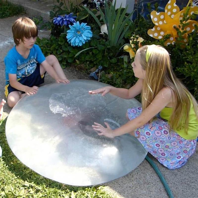 The giant inflatable bubble ball toy shimmering in the sun, ready for summer fun.