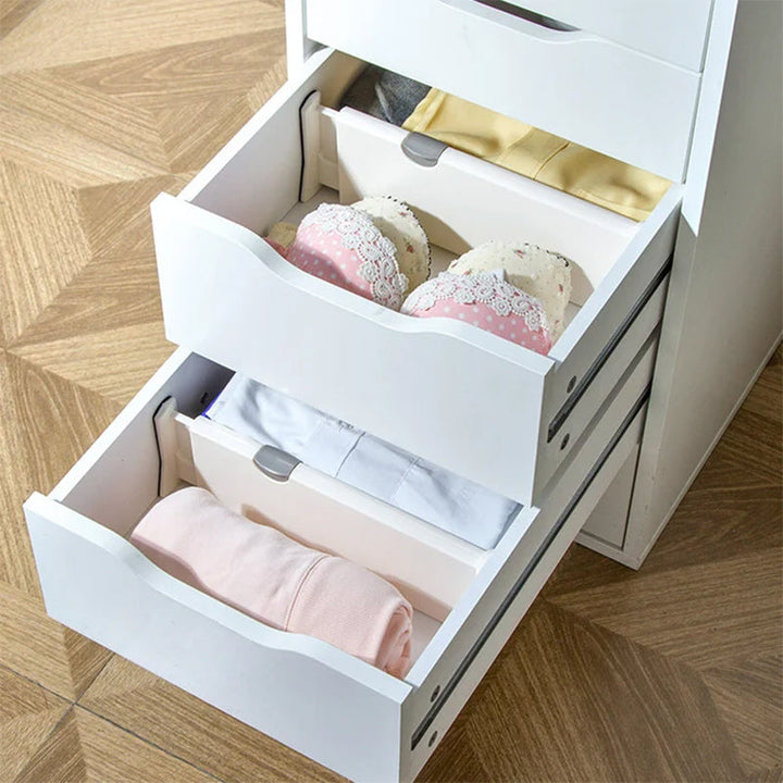 Set of four expandable drawer dividers, shown for organizing cutlery in a kitchen drawer storage