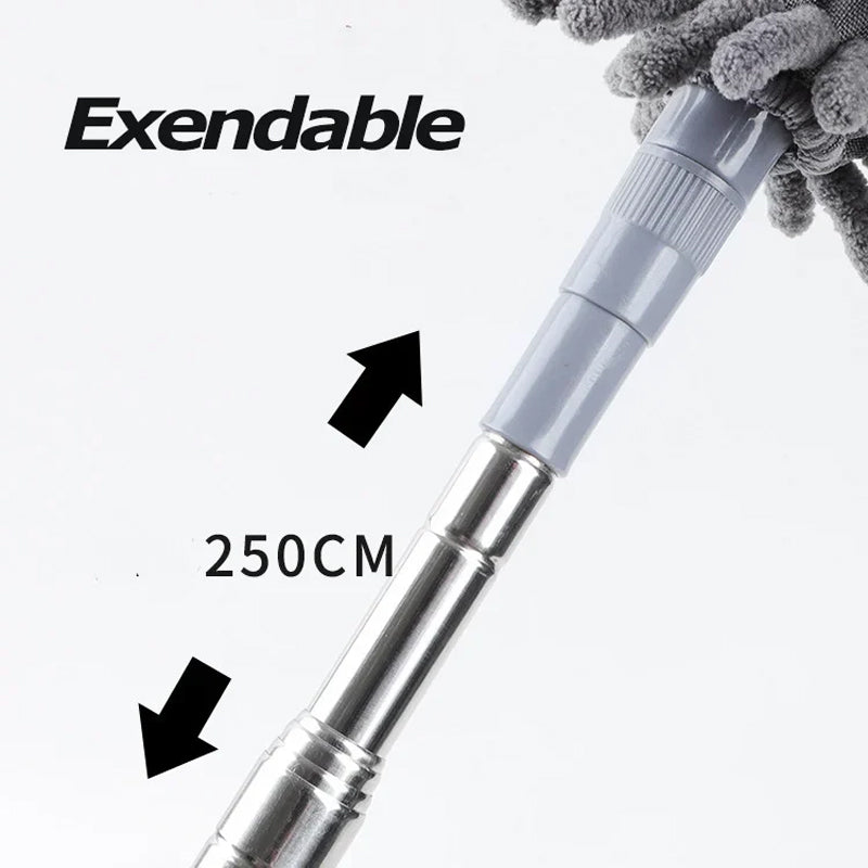 Compact microfiber duster with pole retracted, easy to store. Convenient cleaning tool.