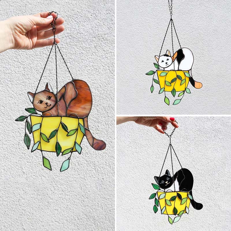 Whimsical cat in terracotta pot stained glass window hanging, colorful garden art