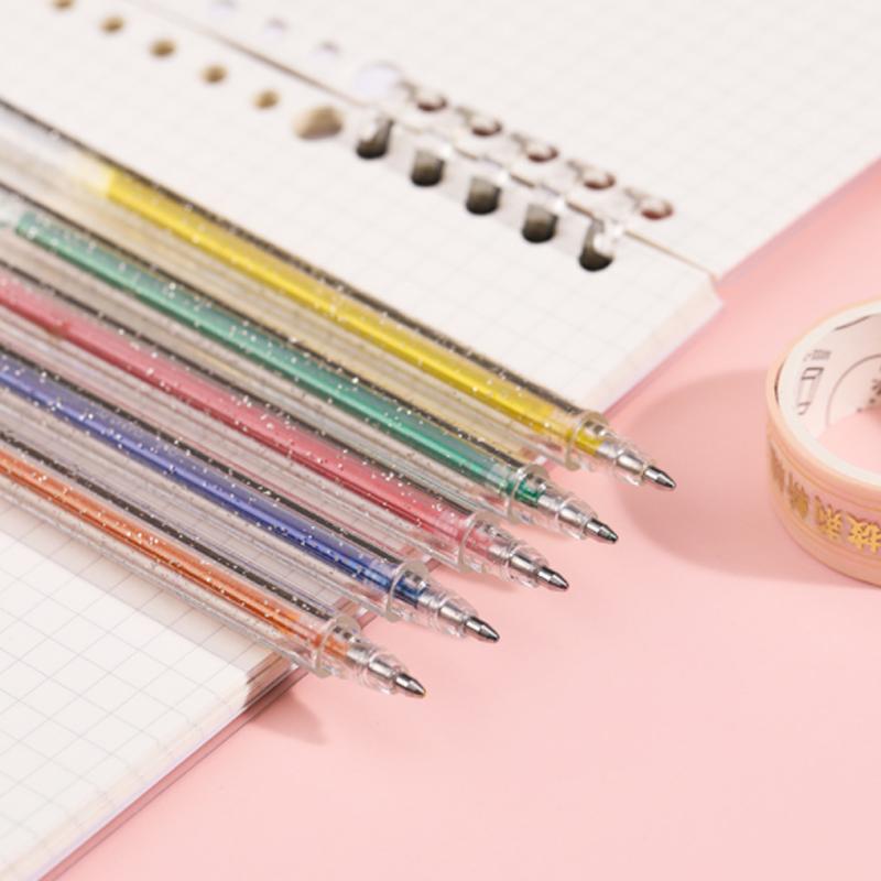 Swatches of all glitter gel pen colors on paper, demonstrating vibrant hues and sparkling effect