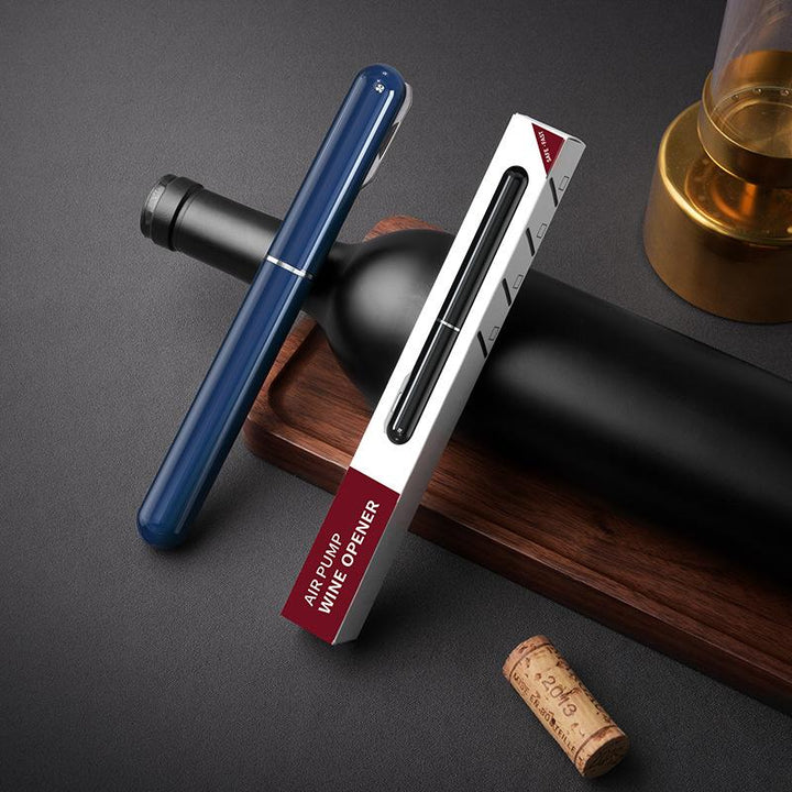 Air Pressure Wine Bottle Opener shown in action, with the cork halfway out of the bottle.