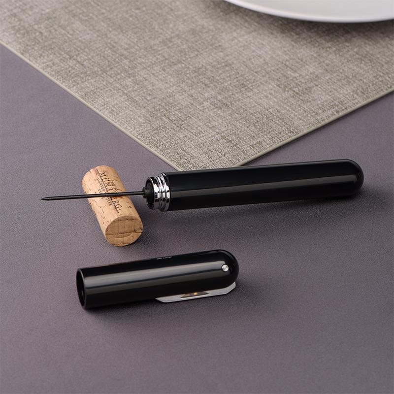 Detail shot of the ergonomic handle of the Air Pressure Wine Opener for comfortable grip.