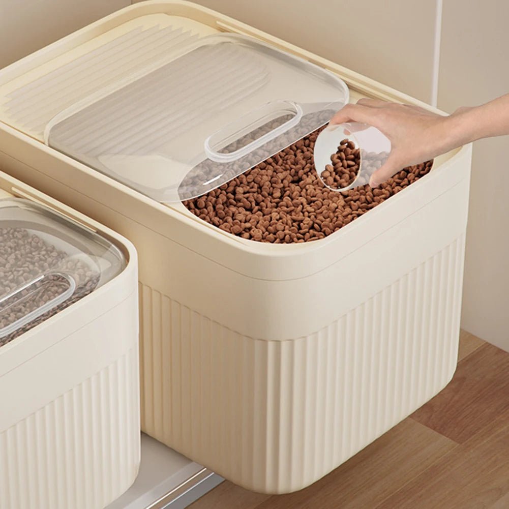 Modern pet food storage bin with scoop for dry dog food. Airtight container keeps kibble fresh & kitchen tidy.