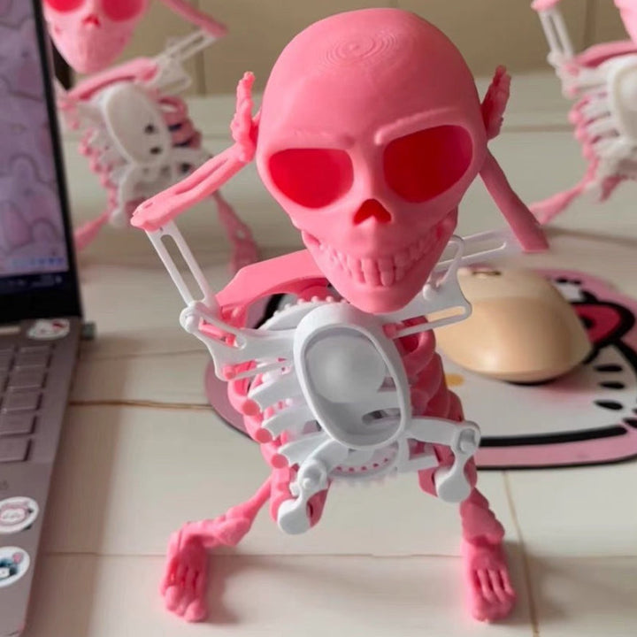 Animated skull desk accessory, compact size, with musical feature and flashing lights, novelty gift