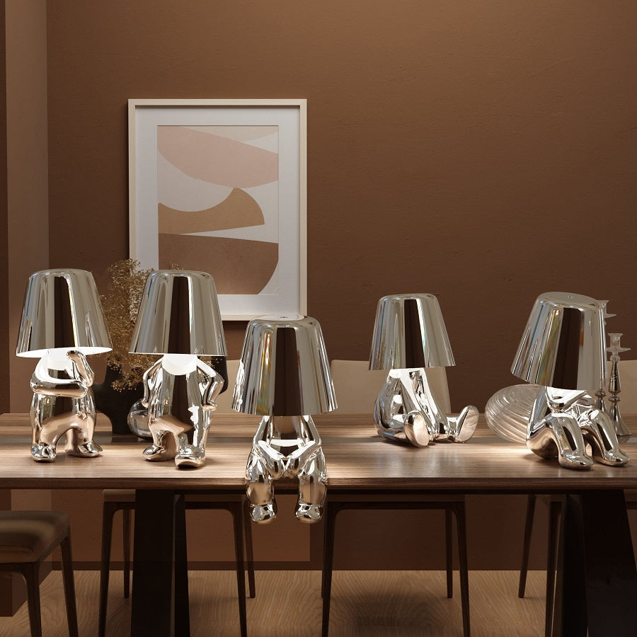 Portable artistic table lamp with touch control & rechargeable LED for any room.