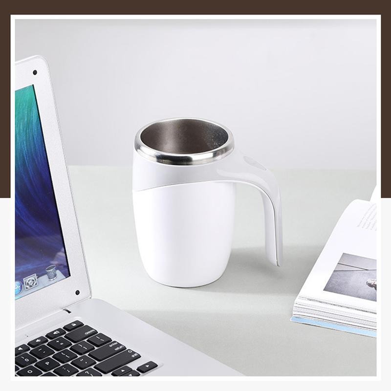 Automatic coffee cup with lid on a 'home and living' tabletop, ready for use.