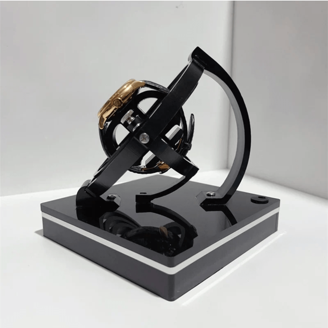 Elegant automatic watch winder, silent, perfect for displaying luxury timepieces. Essential watch collector's item.