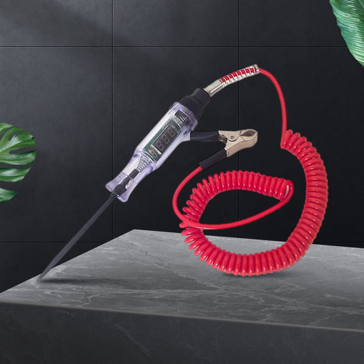 Hand holding auto circuit tester, displaying voltage reading, essential for vehicle maintenance
