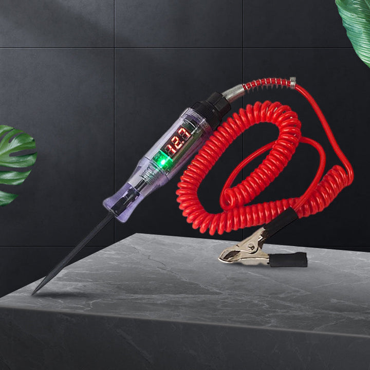 Close-up of automotive circuit tester's LED indicator showing power status during electrical test