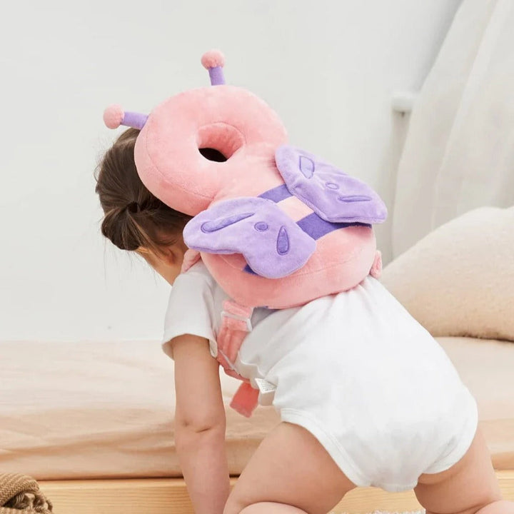 Toddler head protector for crawling and walking safety. Soft cushion prevents falls for little learners.