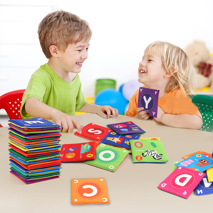 Infant teether attached to a Soft Cloth Learning Book, safe developmental toy