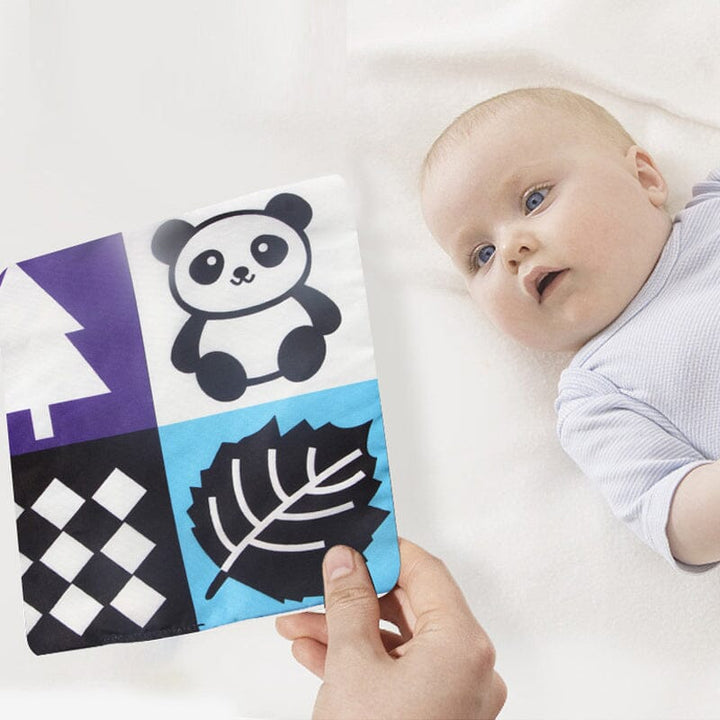 Crinkle toy for babies: Magic Tissue Box, engaging sensory play for infant development.