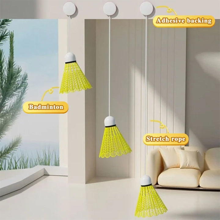 Youth practicing badminton serves with the Badminton Training Rebounder Kit, improving their game.