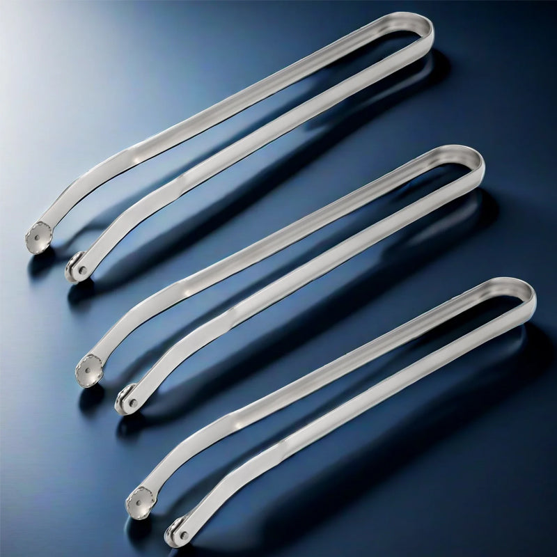 Detail of the tong's head, specifically designed for gripping and turning sausages