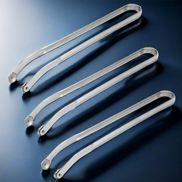 Detail of the tong's head, specifically designed for gripping and turning sausages