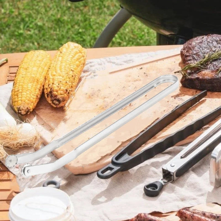 Sausage turning tongs with precision grip, great for BBQ and outdoor cooking