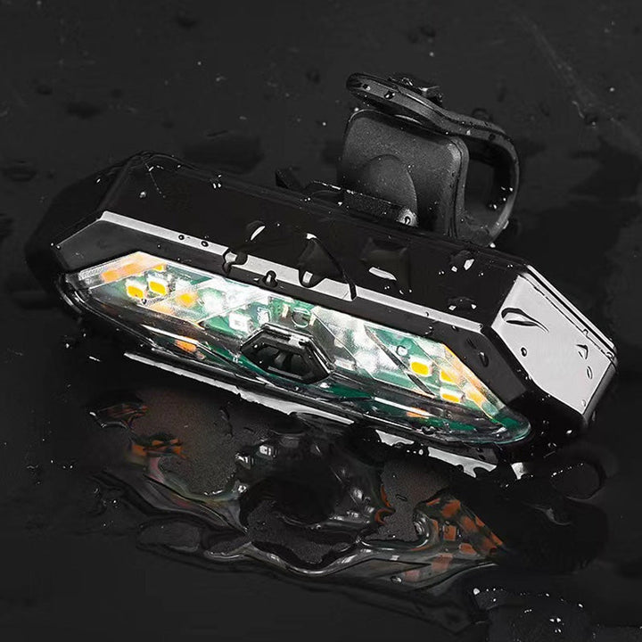 Compact bicycle tail light and horn combo, remote-controlled and USB rechargeable for convenience