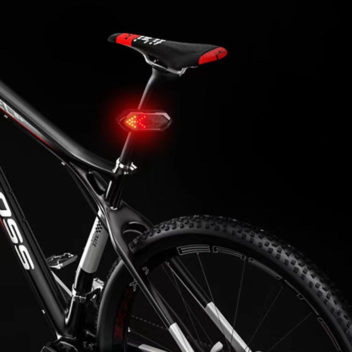 High-visibility bicycle rear light with turn signals & horn, wirelessly controlled for easy operation