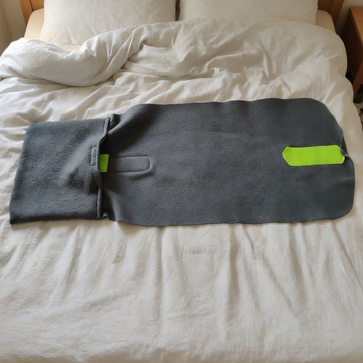 Gray ergonomic travel neck pillow with a machine washable cover, an essential and convenient travel accessory.